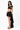 Modelo vistiendo falda pareo asimétrica Mini Paraíso de algodón negro con top a juego, vista frontal de cuerpo entero.